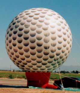 Golfball balloons - 25ft. tall golfball inflatables for rent.